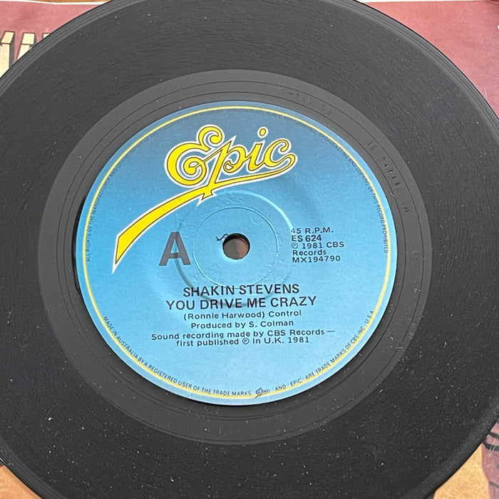Shakin' Stevens - You Drive Me Crazy / Baby You're A Child (7" Vinyl)